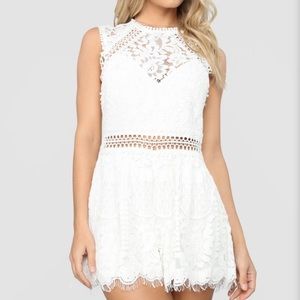 Lace romper never worn with tag attached!